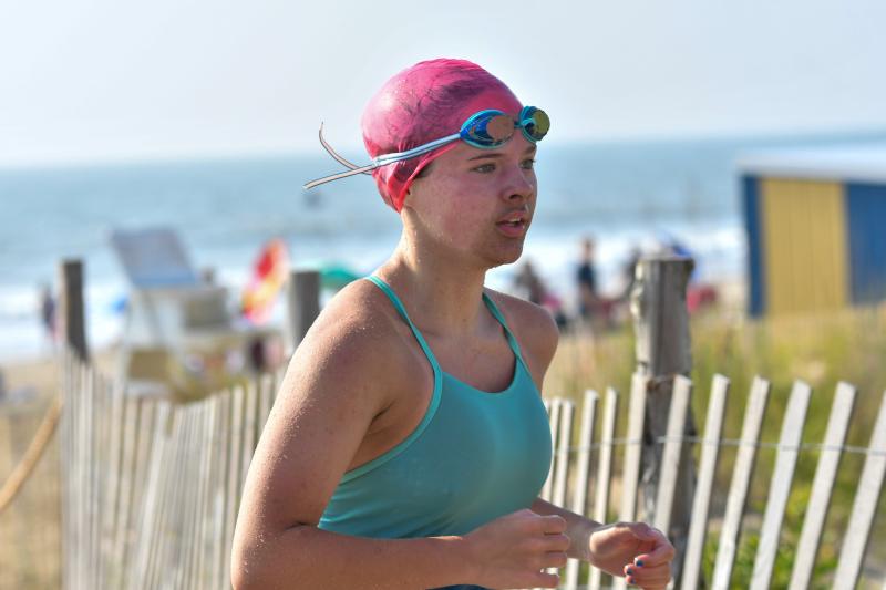 Curse of Fu Manchu slimes colorful 15-year-old swimmer Victoria Evans. DAVE FREDERICK PHOTOS