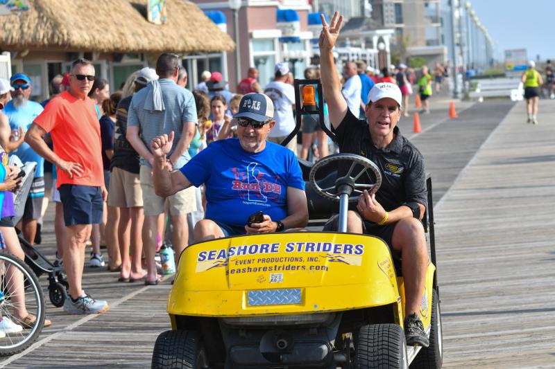 Tim Bamforth and Ray Parker do the electric slide down the Boardwalk.