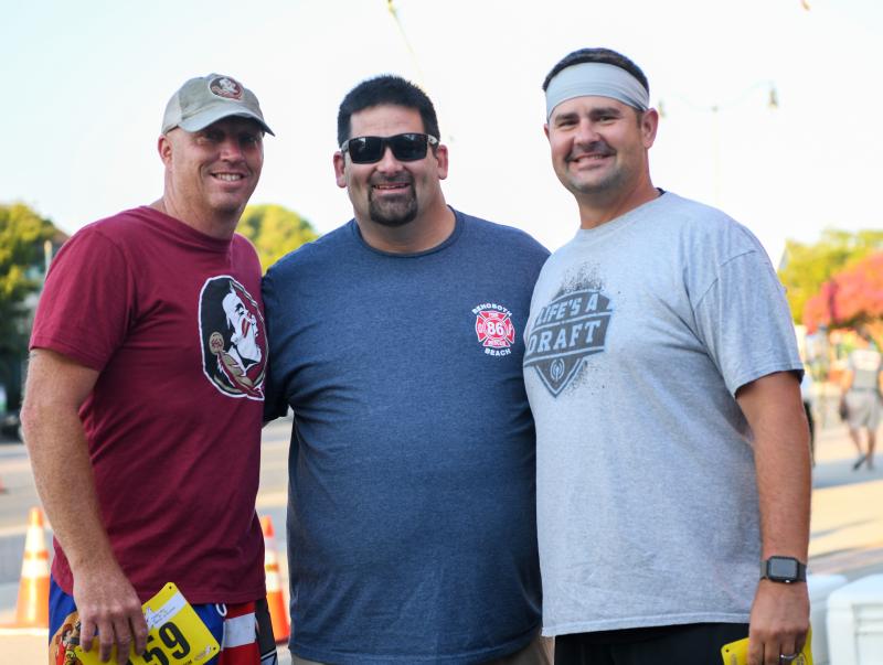 Rick Cooper, Don Don Mitchell and Jonny Howard, mates since high school, ran the Fire Fightin’ 5K. DAVE FREDERICK PHOTOS