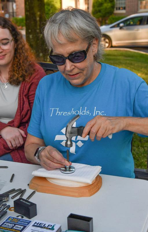 Sue Harris of Thresholds makes a personalized remembrance token.