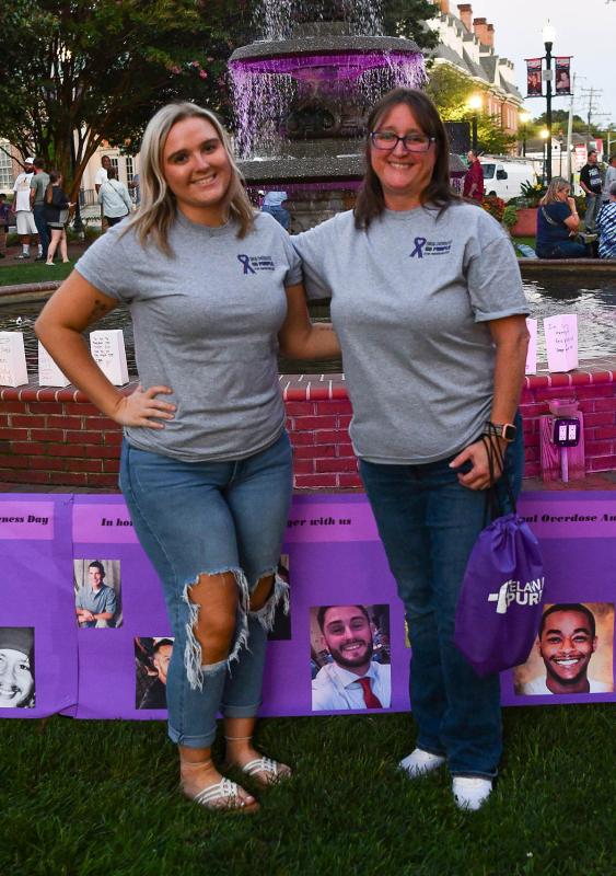 Shelby Meridith, left, and her mom Tammy stand with the picture of their brother/son Joey Prouse, who died on Memorial Day this spring.