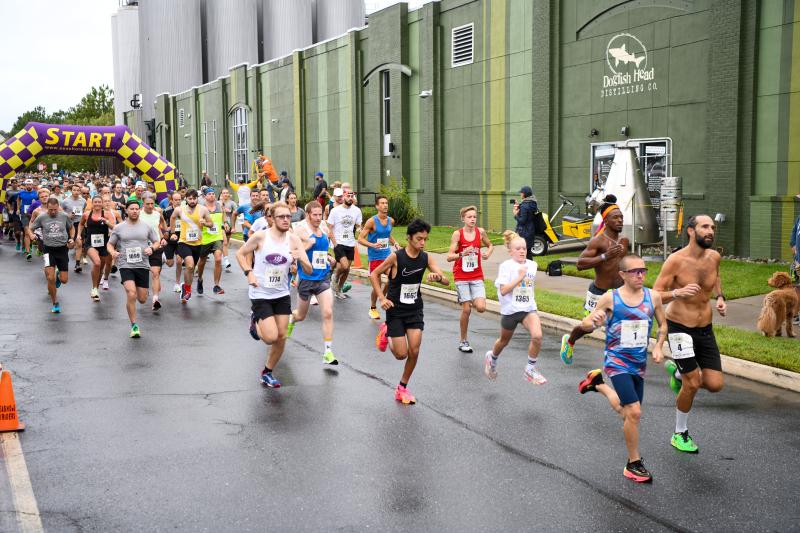 Dylan Smiley and Joey Andrisani lead the pack at the start of the Dogfish Dash Sept. 24 in Milton. DAVE FREDERICK PHOTOS
