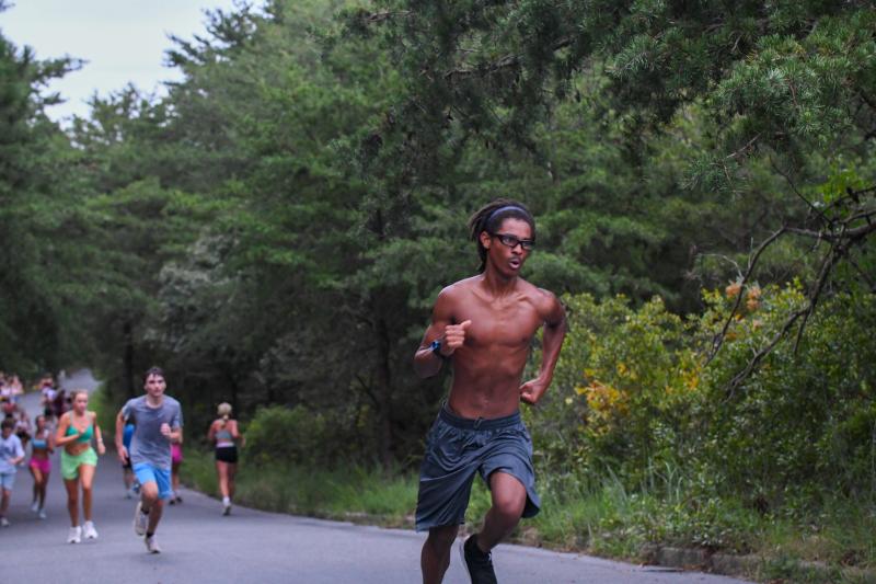 Carter Gibbons doing hill workout. Carter, a sophomore, ran 20:12 at the Lake Forest Invitational.