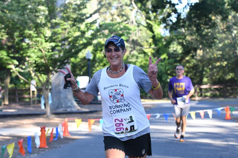 Karen Levin finishes 0.29 seconds off her predicted time of 36:02.