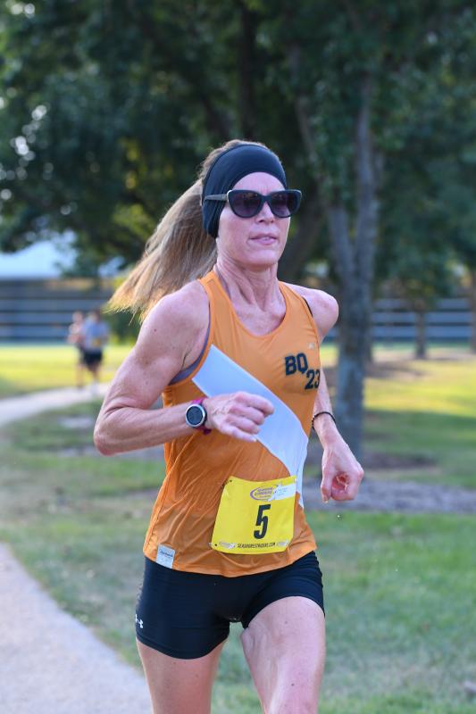 Tanya Karaman wins the women’s masters race with a time of 23:28.