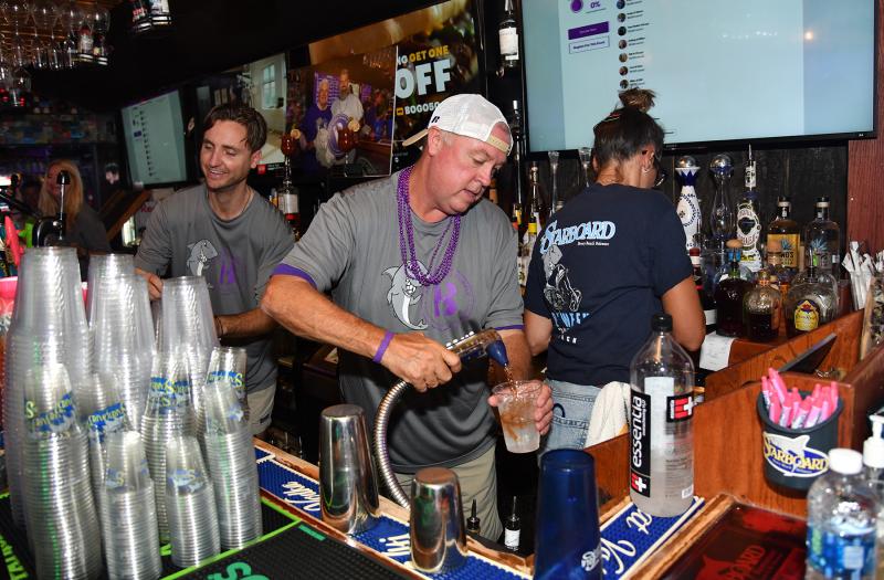 Bartender Mike Simpler pours a tasty libation.