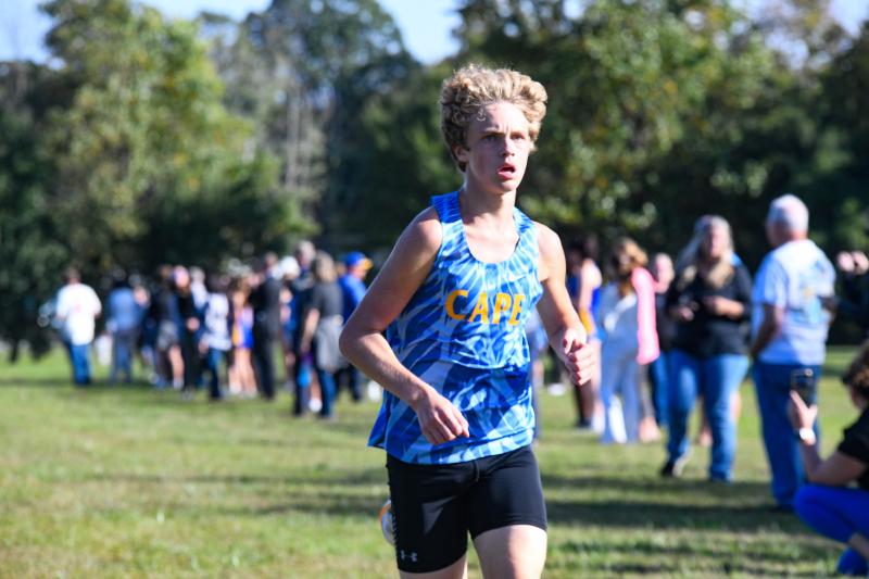 Cape’s Jason Baker logs his team’s best time in 16:26.