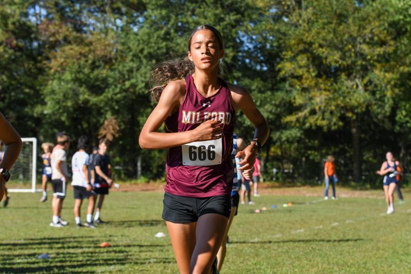 Aviana Shaw of Milford crosses the line in 21:30.