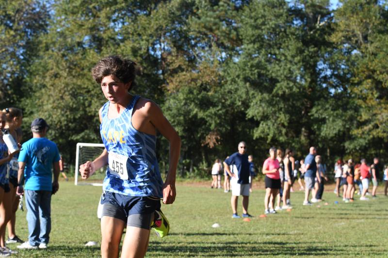 Riley Stazzone of Cape leans to stop the clock at 18:08.