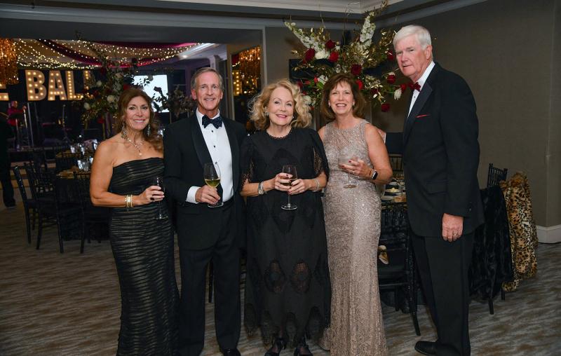Posing for the camera are (l-r) Raquel and David Maynes, Peggy Marilley, and Mary and Tom Enzler.