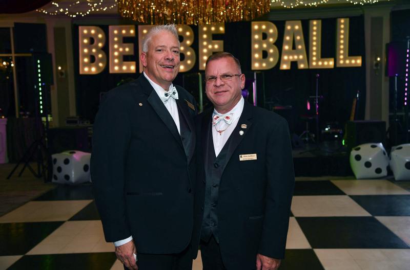 Posing in the ballroom are David Szumski, left, and James Carfagno.