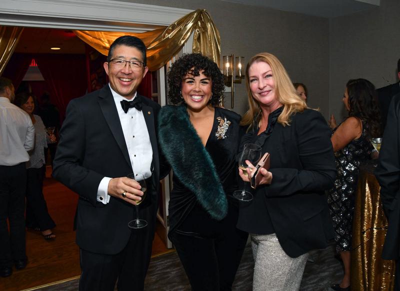 Sharing a moment at the cocktail hour are (l-r) Beebe Healthcare President and CEO Dr. David Tam, Kerrianne Otano and Rebecca Tam.