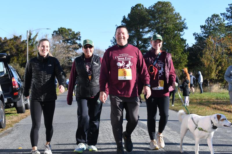 Lorin, Lisa, Keith and Caroline Donovan finish Friendsgiving 5K walk and talk. Rebel Dog tagged along for the journey.