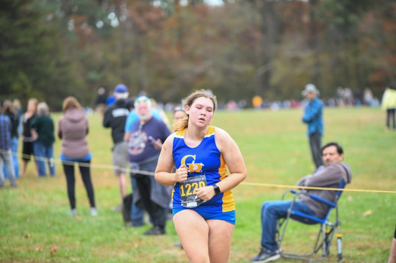 Caesar Rodney runner Presley Robinson crosses the finish line in the JV girls’ race at the Henlopen Conference Championships. DAVE FREDERICK PHOTOS