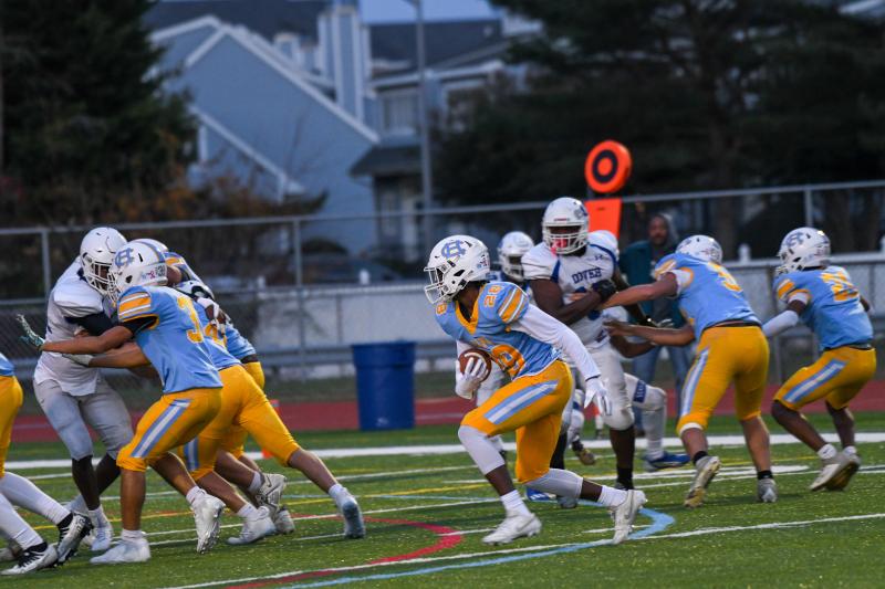 Ozmeer Daisey runs for yardage.