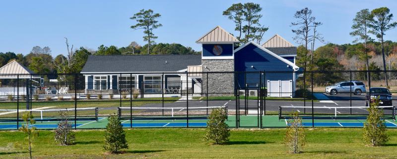The Osprey Point clubhouse and sports courts are open for use by the residents.