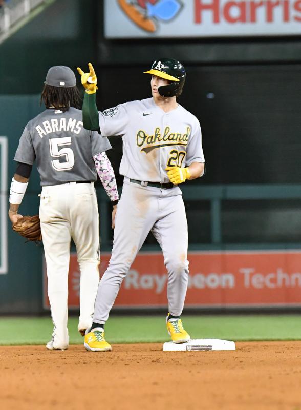 Zack Gelof waves to his parents after hitting a double. DAN COOK PHOTO