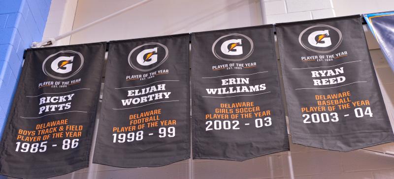 Gatorade Player of the Year banners hang on the Big House wall at Cape. Shown are (l-r) Ricky Pitts, track; Elijah Worthy, football; Erin Williams, soccer; and Ryan Reed, baseball. DAVE FREDERICK PHOTOS