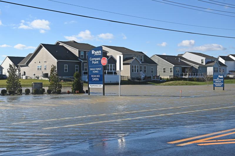 The entrance to Compass Point on Sweetbriar Road near Milton is flooded. NICK ROTH PHOTO