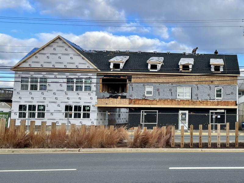 This photo was taken Nov. 25, and more work has taken place since, including new window installations in the southern part of the building that used to house Walsh Electronics and the family home. BERNADETTE HEARN PHOTO