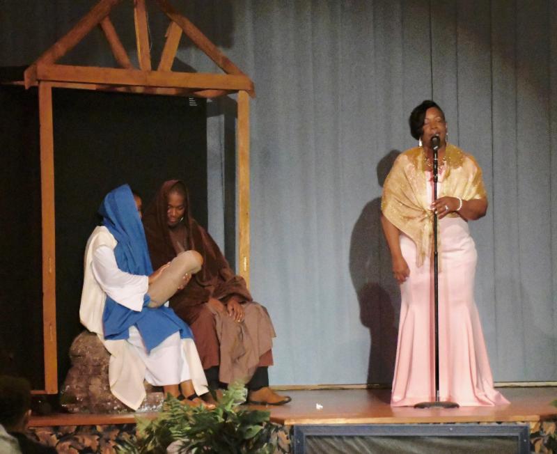 Wescenia Wise sings an inspiring version of “Oh, Holy Night” to Mary aka Rhoda Brown and Joseph aka Te’vonn Bailey.