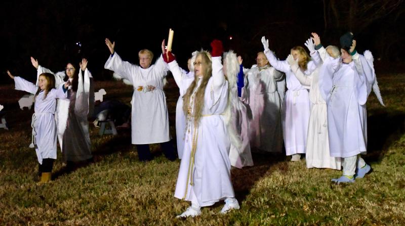 A host of angels on high pronounces the birth of Jesus in Bethlehem as part of a walk at Long Neck United Methodist Church depicting the Christmas story. RON MACARTHUR PHOTOS