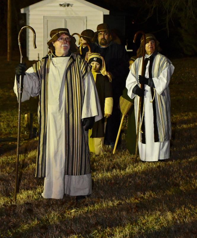 A angel appeared to the shepherds telling them of the birth of Jesus, and they would find the baby wrapped in cloth lying in a manger.