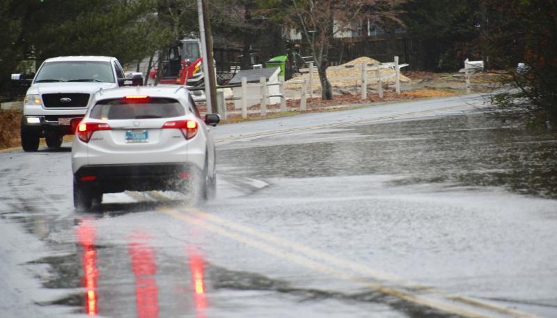 A low section on Hudson Road near Milton is impassable with water drained from across the road. RON MACARTHUR PHOTO