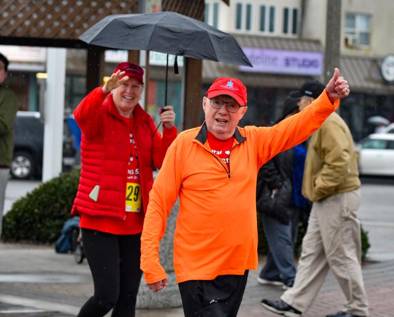 Kathleen and Bernie Gallagher set out on a 5K in the rain. DAVE FREDERICK PHOTO