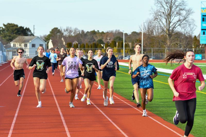 Girls run 400-meter repeats on the first day of track practice Feb. 26. DAVE FREDERICK PHOTOS