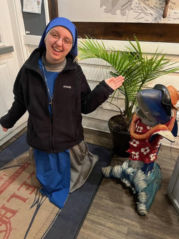 Sister Light hams it up with a local dude before having dinner in Lewes.