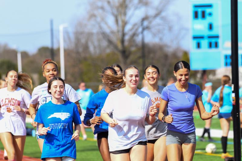 A happy track team trains on a 75-degree day. DAVE FREDERICK PHOTOS