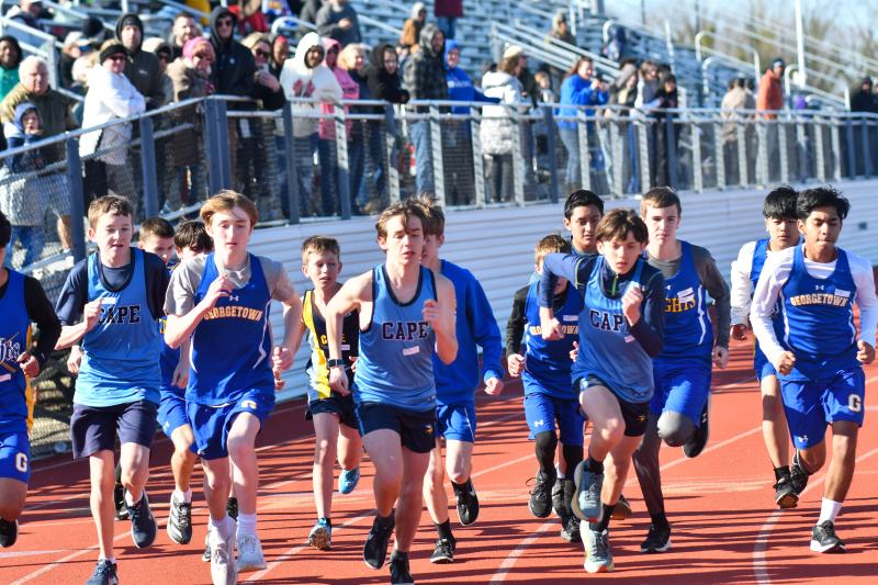 The boys start the 1,600-meter run.