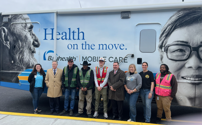 Gathered for the delivery of Bayhealth’s collection food drive items are (l-r) Corrin Jones and Lindsay A. Rhodenbaugh, Bayhealth; Terry Stewart, Kevin Snead and Jaxson Turner, Food Bank of Delaware; Charles Desch, Jane Negrete and Carrie Hart, Bayhealth; and Nate Stevenson, FBD. SUBMITTED PHOTO