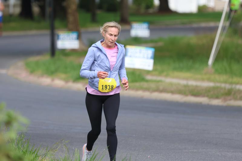 Colleen Tulley of Jupiter, Fla., makes her way past the Fourth Street Preserve. Tulley finished third in the female 60-69 division.