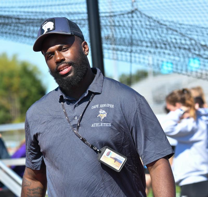 Coach Solomon Cox. His dad Peter ran for Cape and holds the 400-meter record, running in 53 seconds while carrying a broom (sweeping puddles).