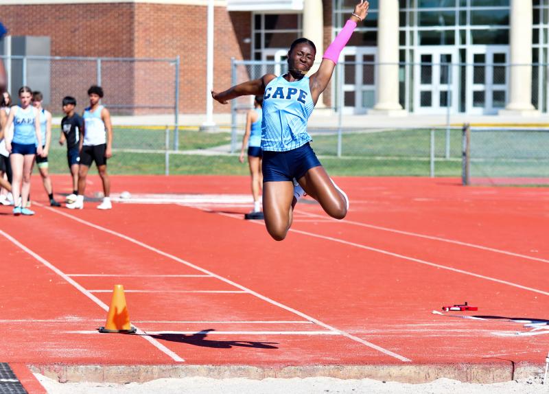 Kiki Johnson wins the long jump in 16-feet-8-inches. DAVE FREDERICK PHOTOS