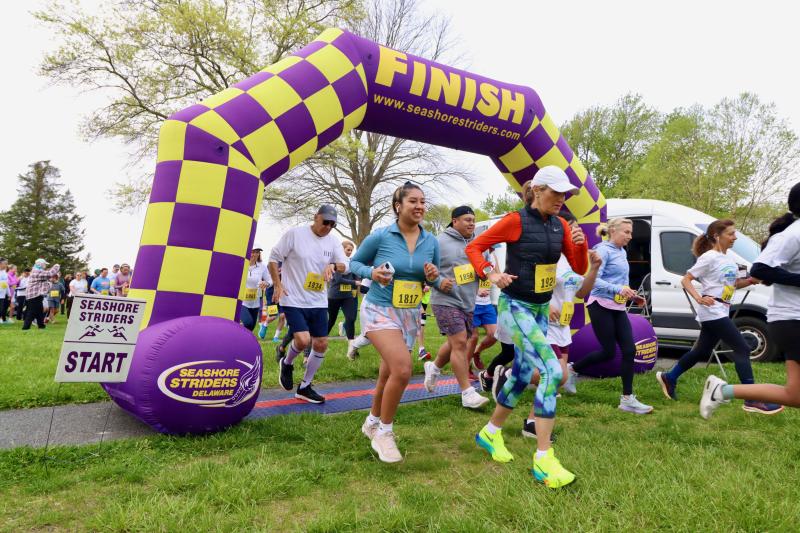 And they’re off. Runners blast out of the starting gate in George H.P. Smith Park for the Race for Open Space.