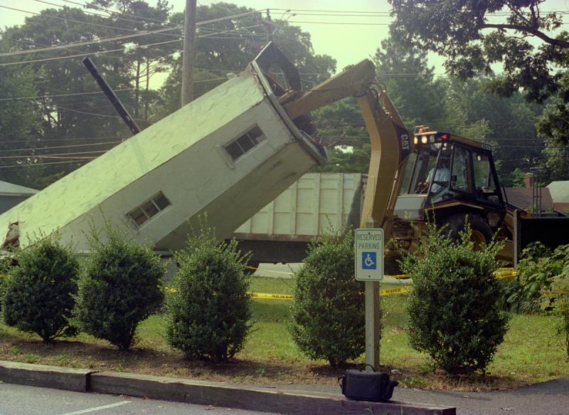 The replica lighthouse is demolished by city staff in 1996. CAPE GAZETTE ARCHIVES PHOTOS