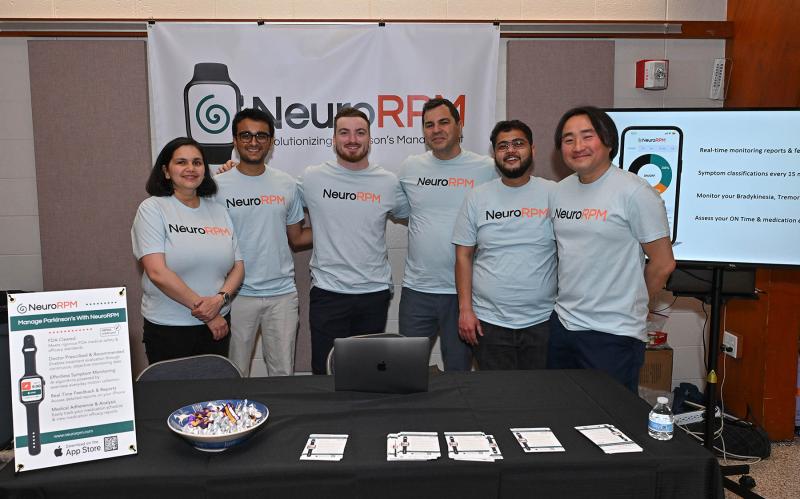 The staff at Neuro RPM displays how their app can help Parkinson’s symptom monitoring on a watch. Shown are (l-r) Pallavi Mishie, Neil Chitre, Ethan Richards, Atila Omer, Varun Hande and Chan Lee.