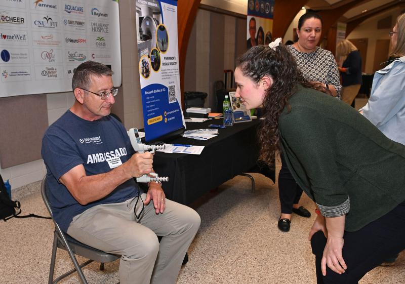 Tom Cosentino gets strength testing from University of Delaware grad student Rebecca Daniels.