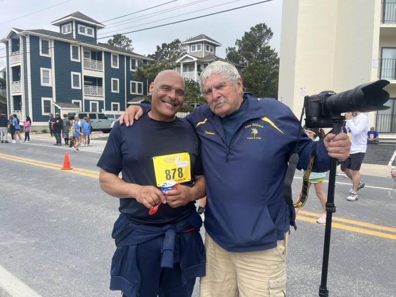 Ronierre Cirwithian and Fredman at the finish of the DQ Dash 5K.
