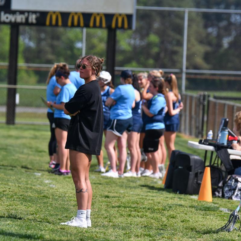 Sussex Tech head coach Nataleigh Hunter watches the field.