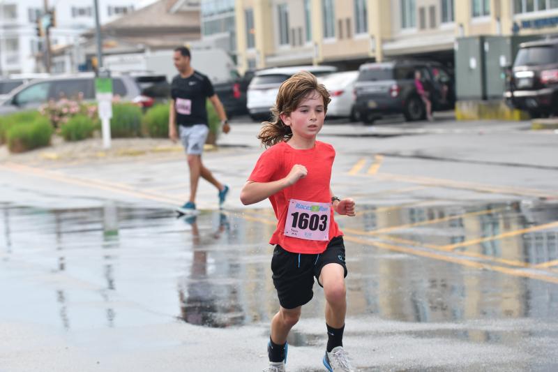 Zach Craig heads home with a time of 22:33.