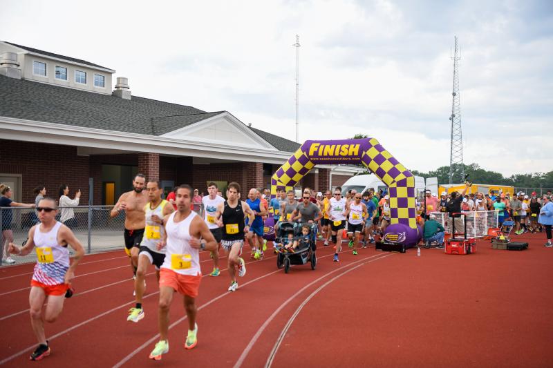 The field starts off for the Masser 5-Miler. DAVE FREDERICK PHOTOS