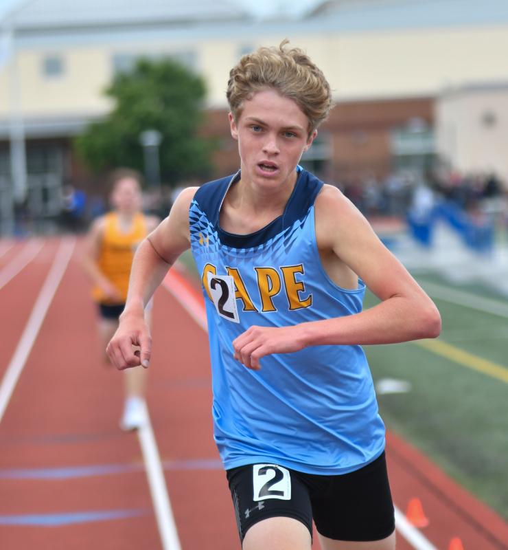 Jason Baker completes the 3,200 meters in 9:28.