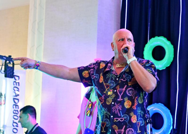 Tom Protack, president of the Beebe Medical Foundation, serves as the evening’s auctioneer.