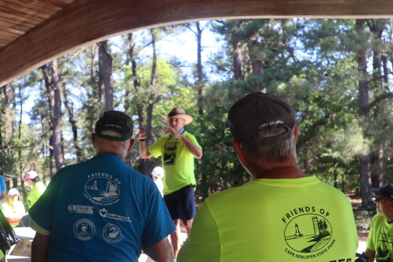 Jeff Underwood, president of Friends of Cape Henlopen State Park, welcomes volunteers to the beach cleanup.