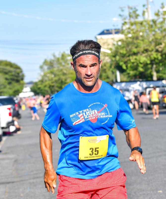 Bryan Bowles focuses on the finish, clocking a time of 23:54.