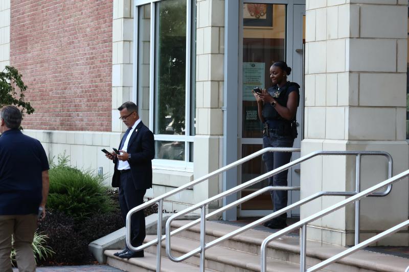 Secret Service agents set up a security perimeter in front of Rehoboth Beach City Hall and around the convention center.